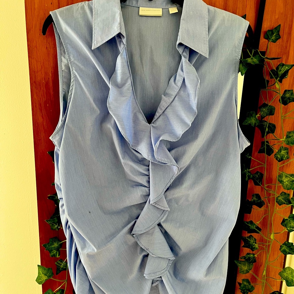 Sleeveless ruffle front blouse